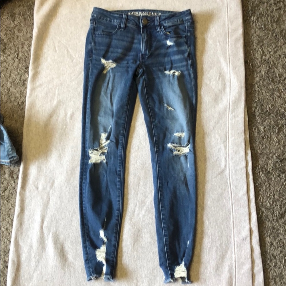 Dark blue ripped jeans